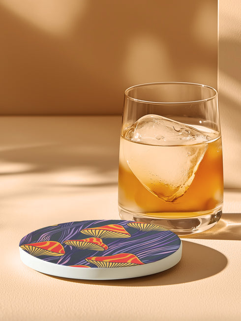Round ceramic coaster featuring orange and yellow mushrooms with striped caps against a dark background with flowing purple lines in a psychedelic 70s style